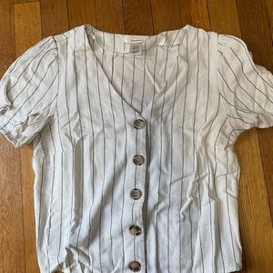 Black and white stripped blouse.